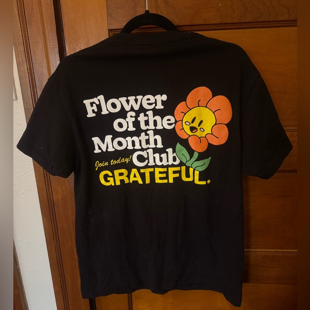 Grateful Apparel Black Graphic T-Shirt with Flower Design